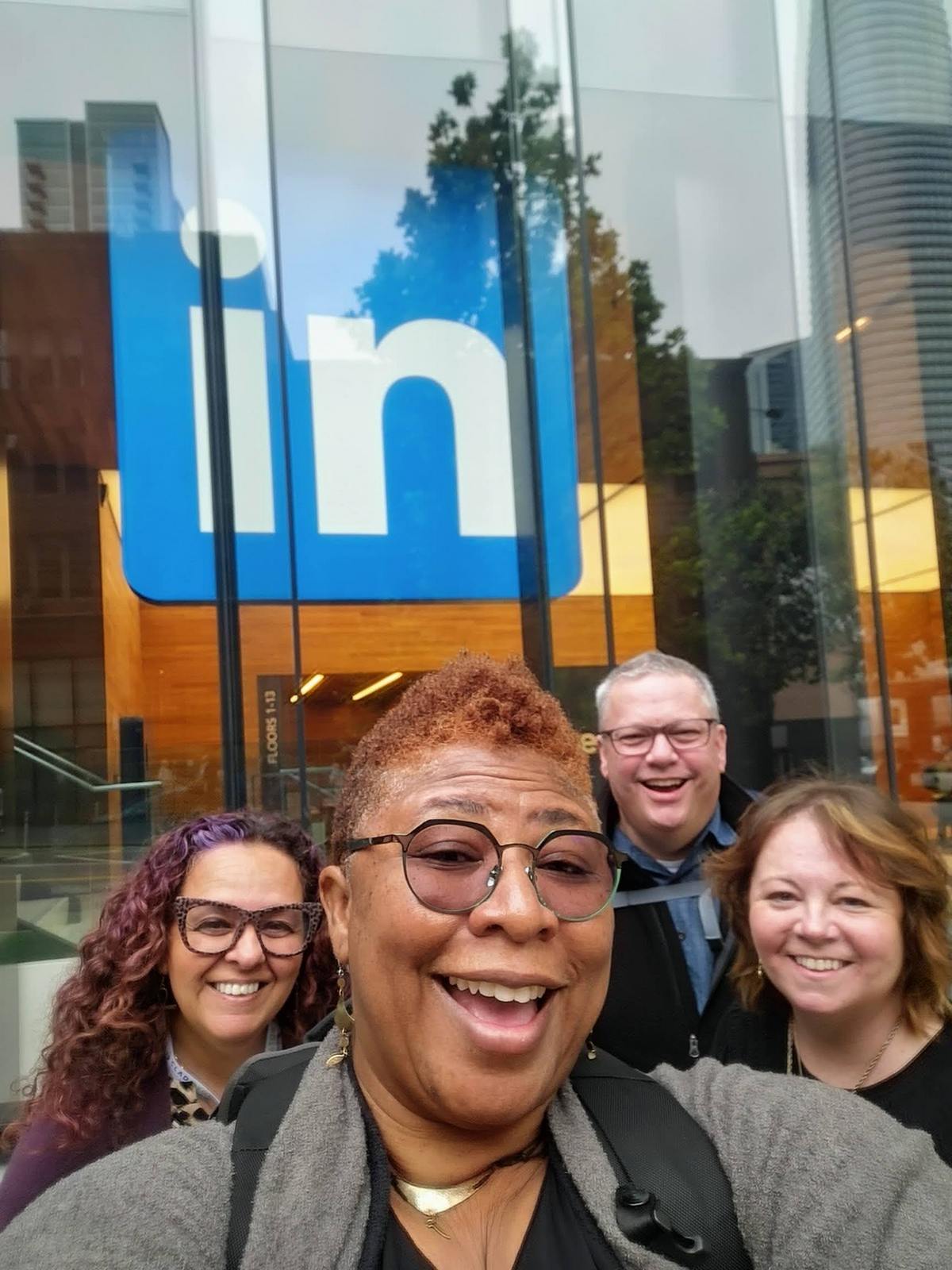 Keith Johnston with three event industry colleagues taking a group photo outside the LinkedIn offices